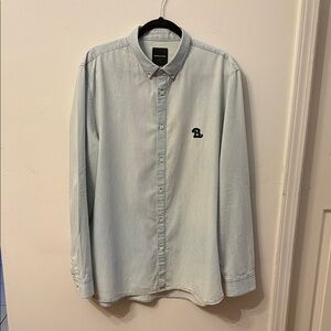 Barney Cools Light Blue Button-Down Shirt with Navy Blue Logo